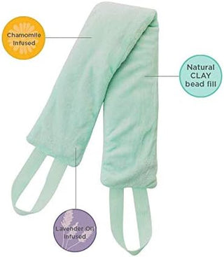 The "Weighted Neck & Body Wrap" by TheraWell is a light green, soft neck wrap infused with chamomile and lavender oil, filled with natural clay beads for muscle pain relief. Two loops are attached at the ends for easy positioning. Annotations indicate the aromatherapy benefits and the hot & cold therapy feature along with the natural clay bead fill.