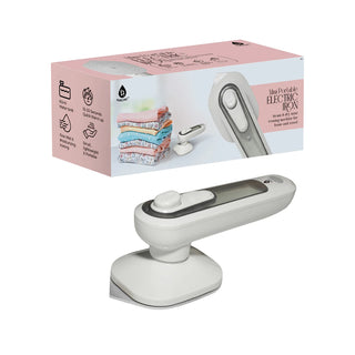 The Pursonic Portable Electric Travel Iron, compact and handheld, is displayed alongside its packaging. The pink box with white detailing features an image of the iron and neatly folded clothes. The white iron boasts a gray handle and a digital display, along with quick heat-up capabilities and global voltage compatibility.
