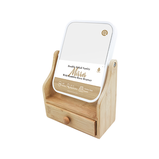The Pursonic Vanity Mirror with Storage Drawer boasts a double-sided design and rectangular frame, elegantly perched on a sturdy bamboo base that includes a convenient small pull-out drawer. Supported by an attractive wooden stand, this mirror fits seamlessly into any beauty routine. Eco-friendly packaging emphasizes its built-in LED lights that offer enhanced visibility.