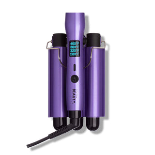 The Cortex 2in1 Digital & Foldable Triple Barrel Waver is a purple hair styling tool featuring dual functionality and a temperature display indicating various heat settings (400°F, 360°F, 320°F, 280°F). It boasts a digital screen for precision and has a power cord attached at the bottom. The device appears to be designed as a curling iron with a triple-barrel design for effortless glam waves.